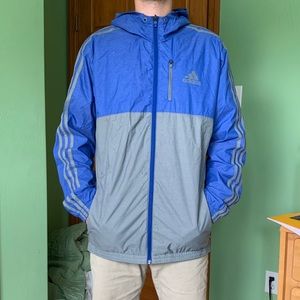 Blue and grey Adidas windbreaker jacket